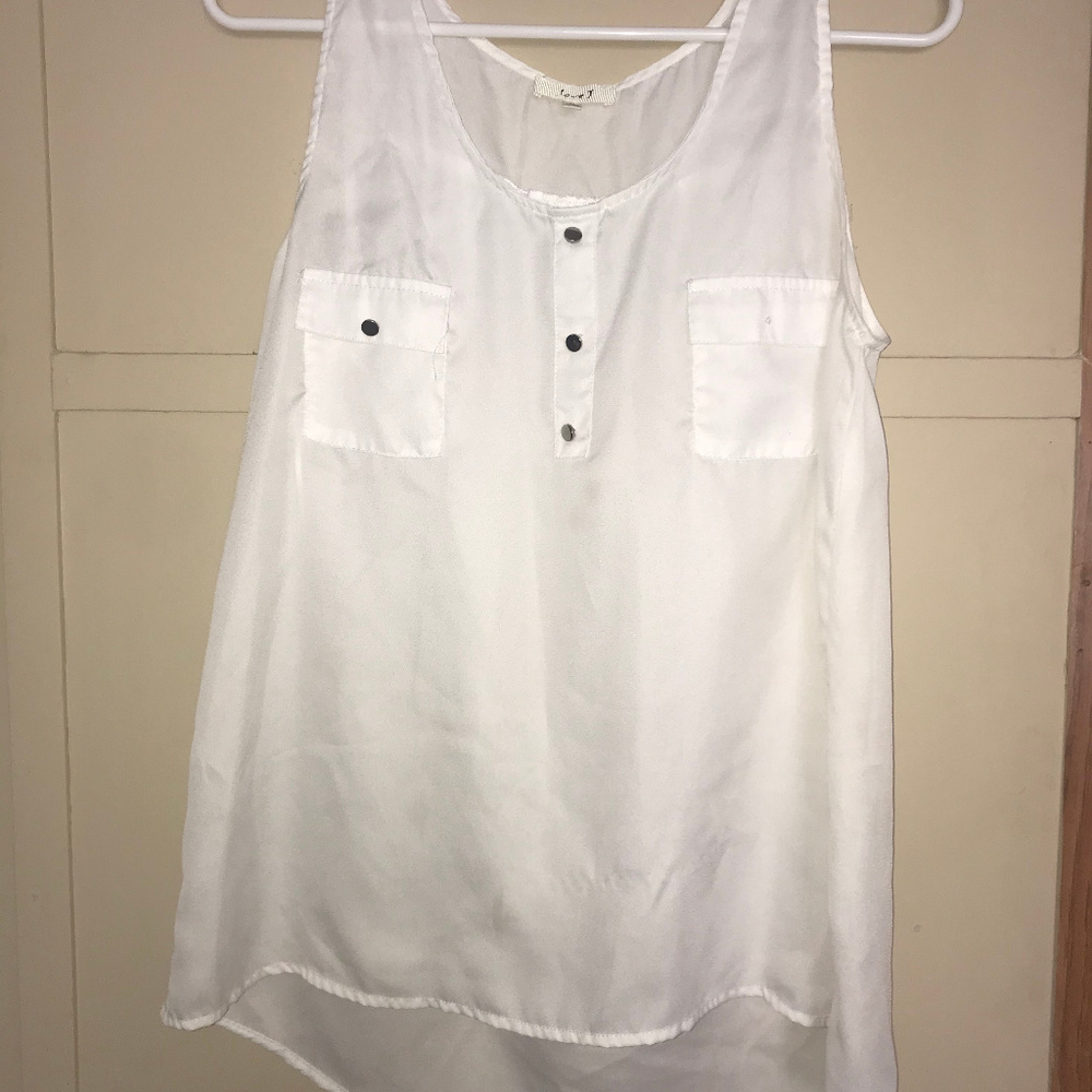 white sleeveless blouse